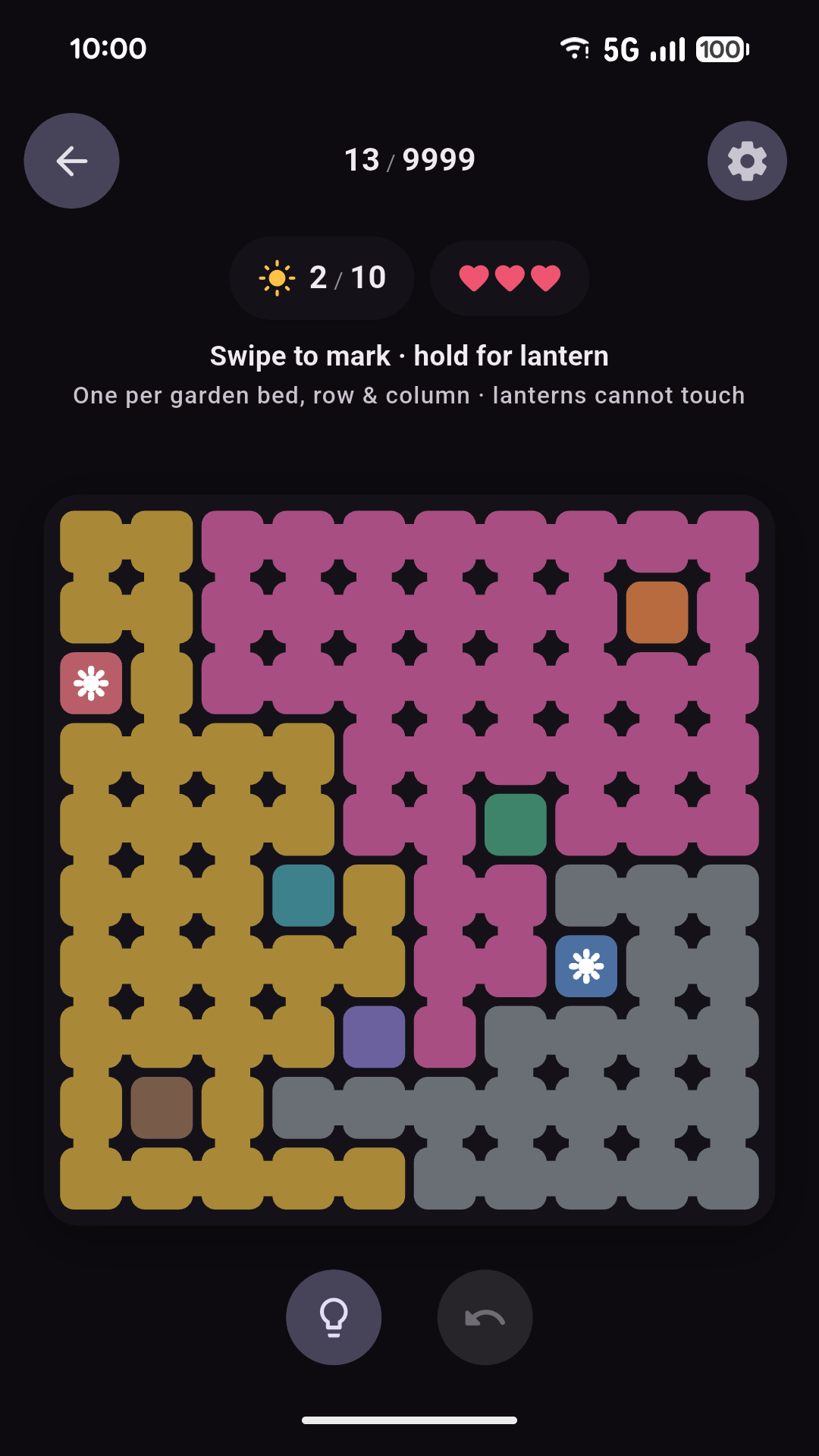 A dark-mode 10 by 10 Yodoku puzzle with two lanterns and colorful connected garden regions