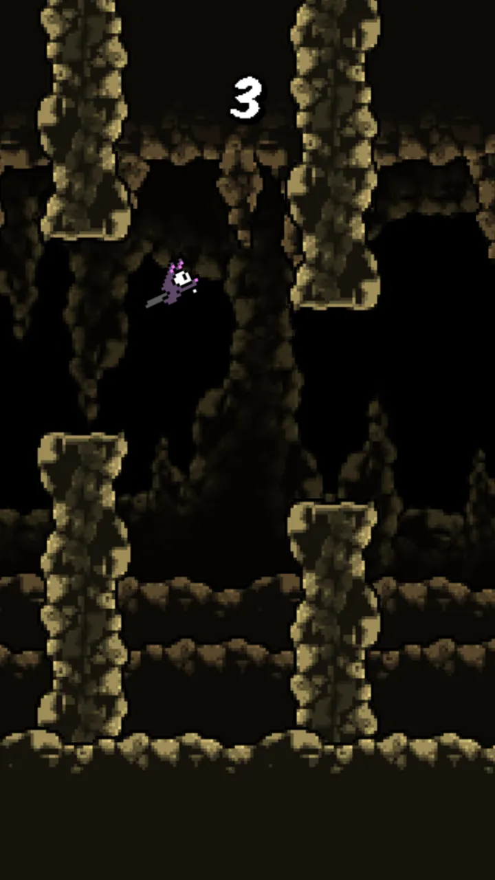 A purple bat flies between stone columns in a dark pixel cave, with a score of 3 above it.